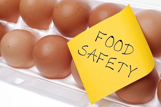 9986944 - eggs can carry salmonella food safety concept concept with brown egg and yellow note.