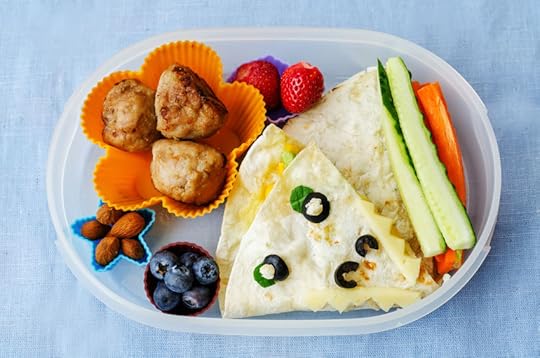 42738826 - school lunch box for kids with food in the form of funny faces