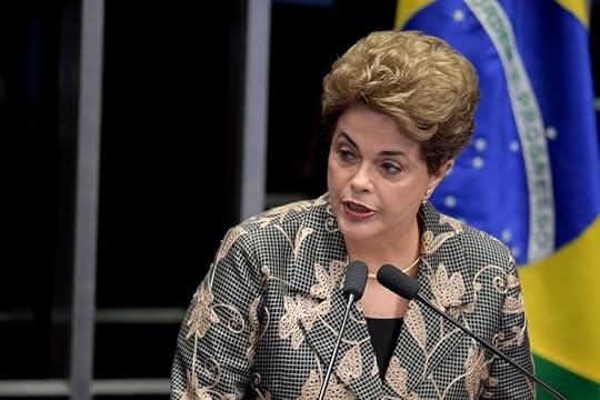 Suspended Brazilian President Dilma Rousseff delivers a speech during her testimony on the impeachment trial at National Congress in Brasilia on August 29, 2016. Rousseff arrived at the Senate to defend herself confronting her accusers in a dramatic finale to a Senate impeachment trial likely to end 13 years of leftist rule in Latin America's biggest country. / AFP PHOTO / EVARISTO SA