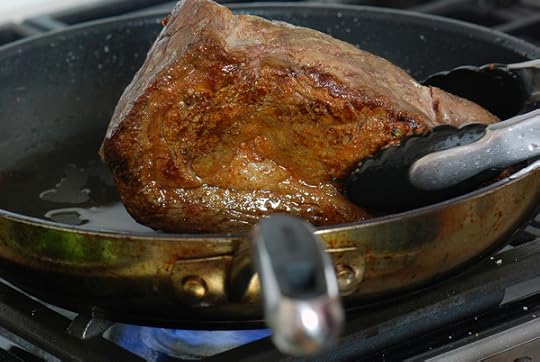 Sous vide ribeye morel scapes searing