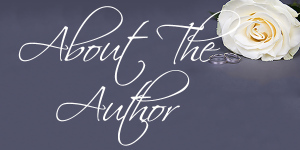 beautiful white rose flower and wedding rings over grey