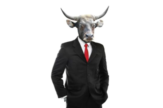 Man in business suit with a bull head