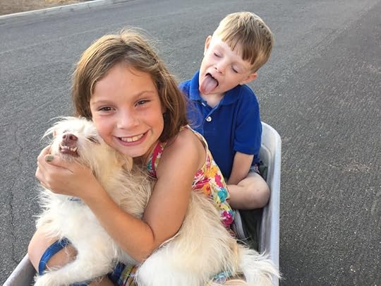 Kids and Oscar in wagon