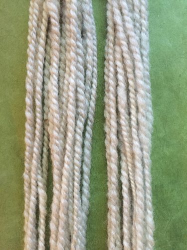 Left: top drafted woolen, right: top carded and pulled into roving and spun woolen.