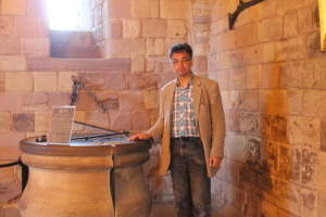 Standing by the head of the well