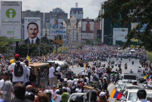 Demonstrators take part in the