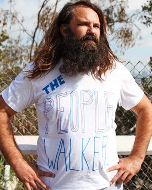 Chuck McCarthy charges per mile to walk with and talk to customers in LA, an example of the growing companionship industry.