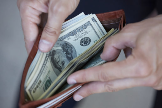 man holding a wallet