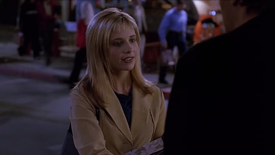 Buffy's hair looks like a bad wig. There's no other way to describe it. Her bangs are way too short for her face.