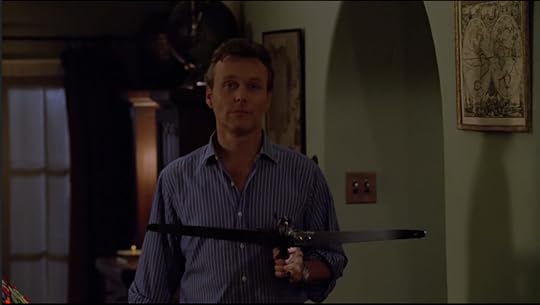 Giles, holding a crossbow with an expression that clearly displays that he's out of fucks.