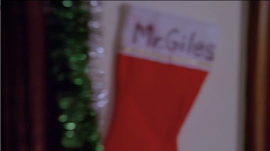 A Christmas stocking that says 