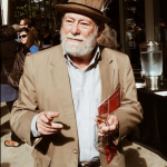 Marvin Bell in a hat. Photo by Sam Roxas-Chua.