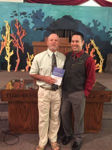 After giving first copy of Marriage God's Way to Dad during morning worship service at WCC.