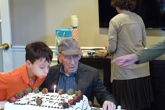 Great grandson Jacob helps blow out the candle (just 1--102 candles may have meant a visit from the fire department!)