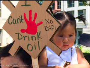 CC-BY-NC-ND by Anne Meador @ Cool Revolution "I Can't Drink Oil No DAPL"