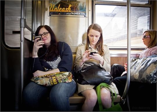 Commuters using smartphones