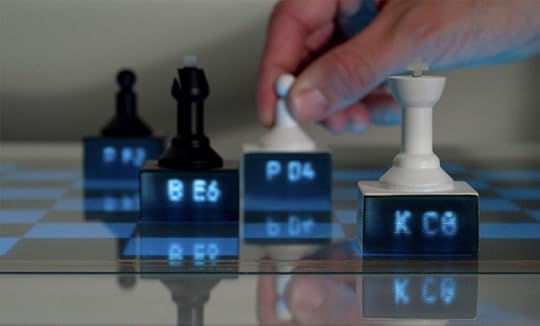 3D printed chess pieces with light pipes on an interactive tabletop that suggest your next move