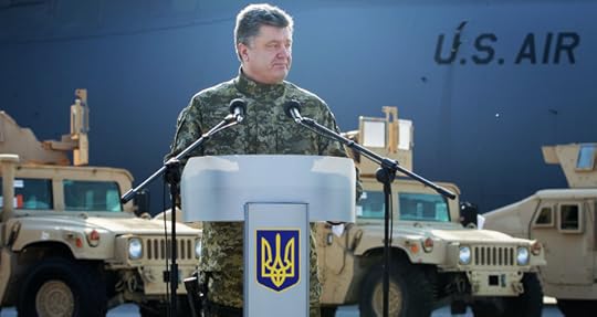 Ukrainian president Poroshenko receives the first US aircraft with armored vehicles