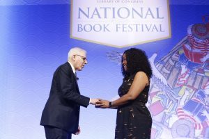 Festival Co-chairman David Rubenstein greets Shonda Rhimes on the main stage. Photo by Shawn Miller.