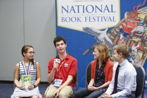 “A Book That Shaped Me” grand-prize and Delaware state winner Rachel Smookler (left) speaks with Scholastic News Kids Press. Photo by Shawn Miller.