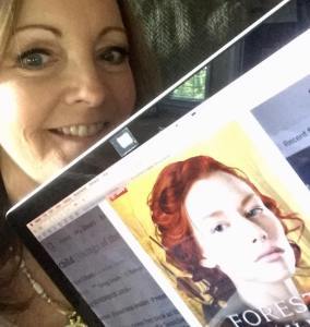Early Reader Carrie with her copy of Forest Child!