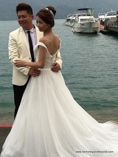 wedding couple at Sun Moon Lake National Scenic Area in Yuchi Township, Nantou County, Taiwan