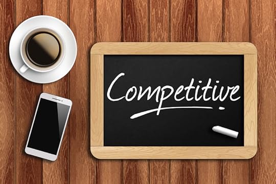 41601595 - coffee, phone and chalkboard with word competitive.
