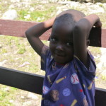 Look at this cute kid. Don't you want to help him?