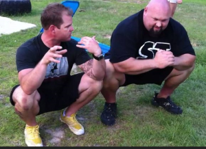 Dr. Kelly Starrett and Donnie Thompson in Garland Pose