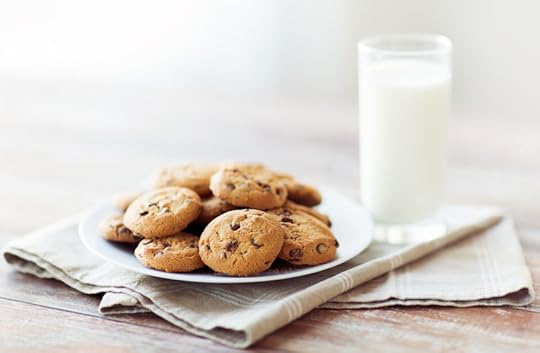 48507390 - food, junk-food, culinary, baking and eating concept - close up of chocolate oatmeal cookies and milk glass on plate