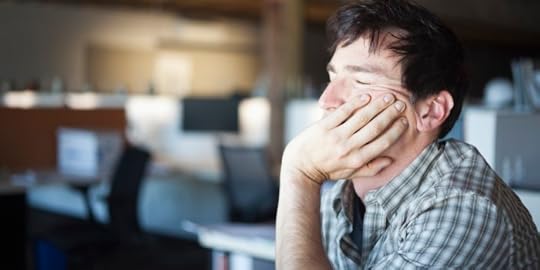 Man taking a power nap at desk