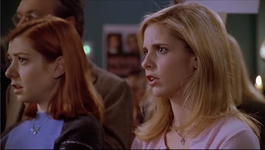 Buffy and Willow staring in disbelief at Joyce's words.