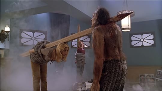 Buffy has accidentally jabbed the stake she's tied to through the demon's neck.