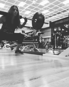 @mouzouu squatting in a Lifetime Fitness gym