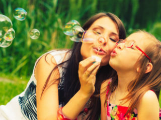 7 Primal Ways to Bridge the Parent Happiness Gap in line