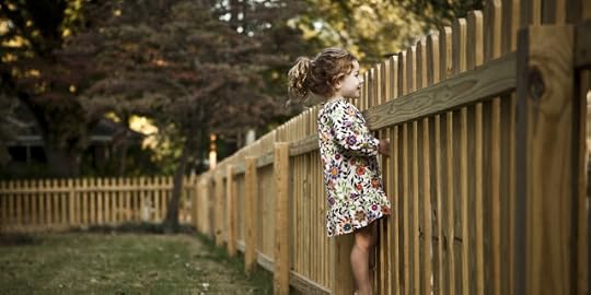 Child at fence