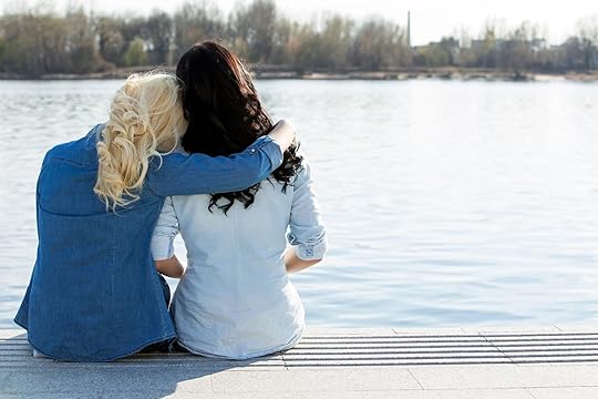 28192207 - friendship best friends sitting by the river