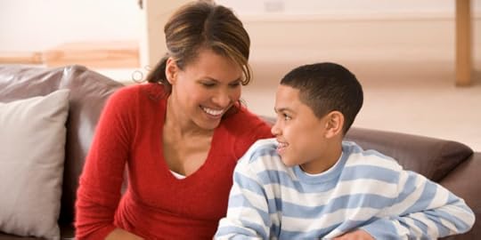 Mother and son with remote control