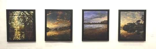 Four paintings on a wall