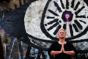 author annette oppenlander doing yoga outdoors