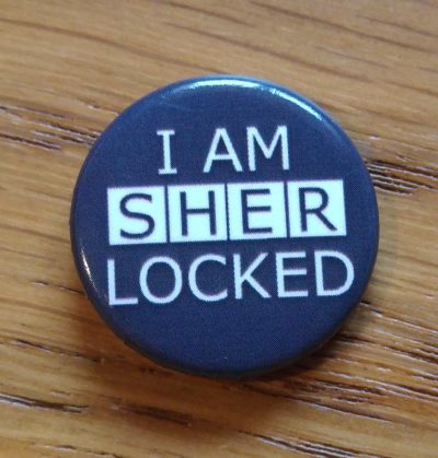 Badge saying