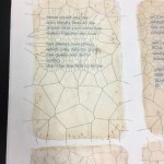 Close-up of finished pressed page. Laser cut text pressed within 5 layers of bio-paper to form one large single sheet.