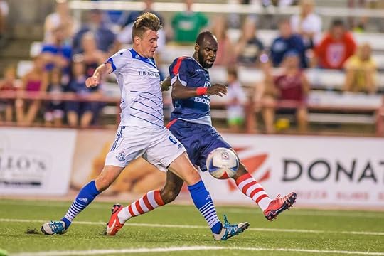 FCE's Nik Ledgerwood battles with Indy's Don Smart earlier this season. PHOTO: TREVOR RUSZKOWSKI