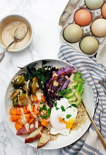 vegetarian buddha bowls with roasted fall and winter vegetables, tahini, poached egg, and quinoa