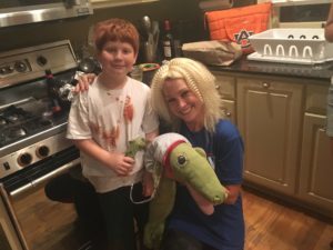 Here I am (as the entire 1980s) with a boy with a pet alligator.