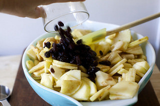 adding the rum-soaked raisins