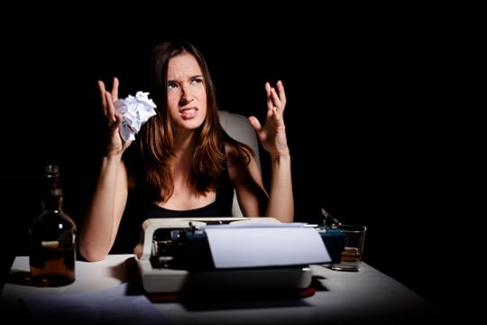 Frustrated young writer having writer's block