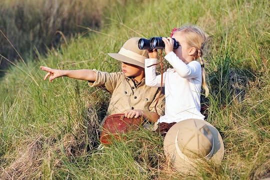 14874069 - cute children playing pretend safari game together outdoors. happy brother and sister