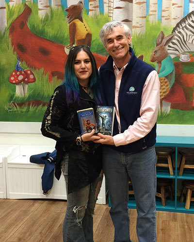 My first book signing was at the Reading Bug in California. Here I am with a fan who grew up reading the Merlin Saga.