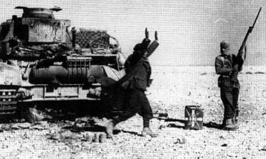 Italian soldier surrendering to an Indian soldier in North Africa during Operation Crusader, Nov 1941 (public domain via WW2 Database)